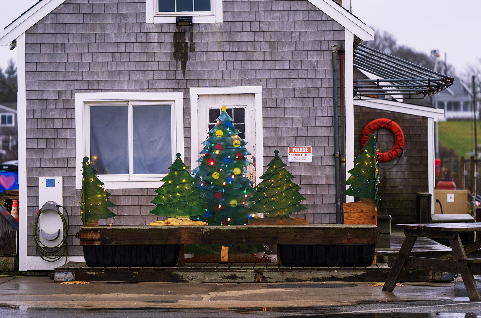 https://vineyardgazette.com/sites/default/files/article-assets/main-photos/2023/tj_menemsha_texaco_christmas_trees.jpg