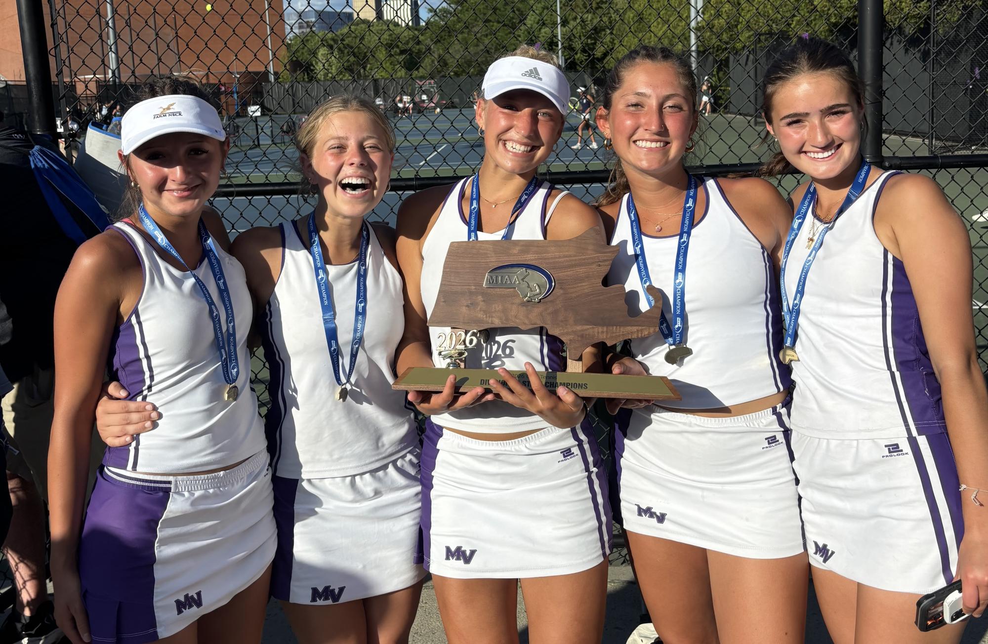 Girls tennis is all smiles after winning the state championship Saturday.