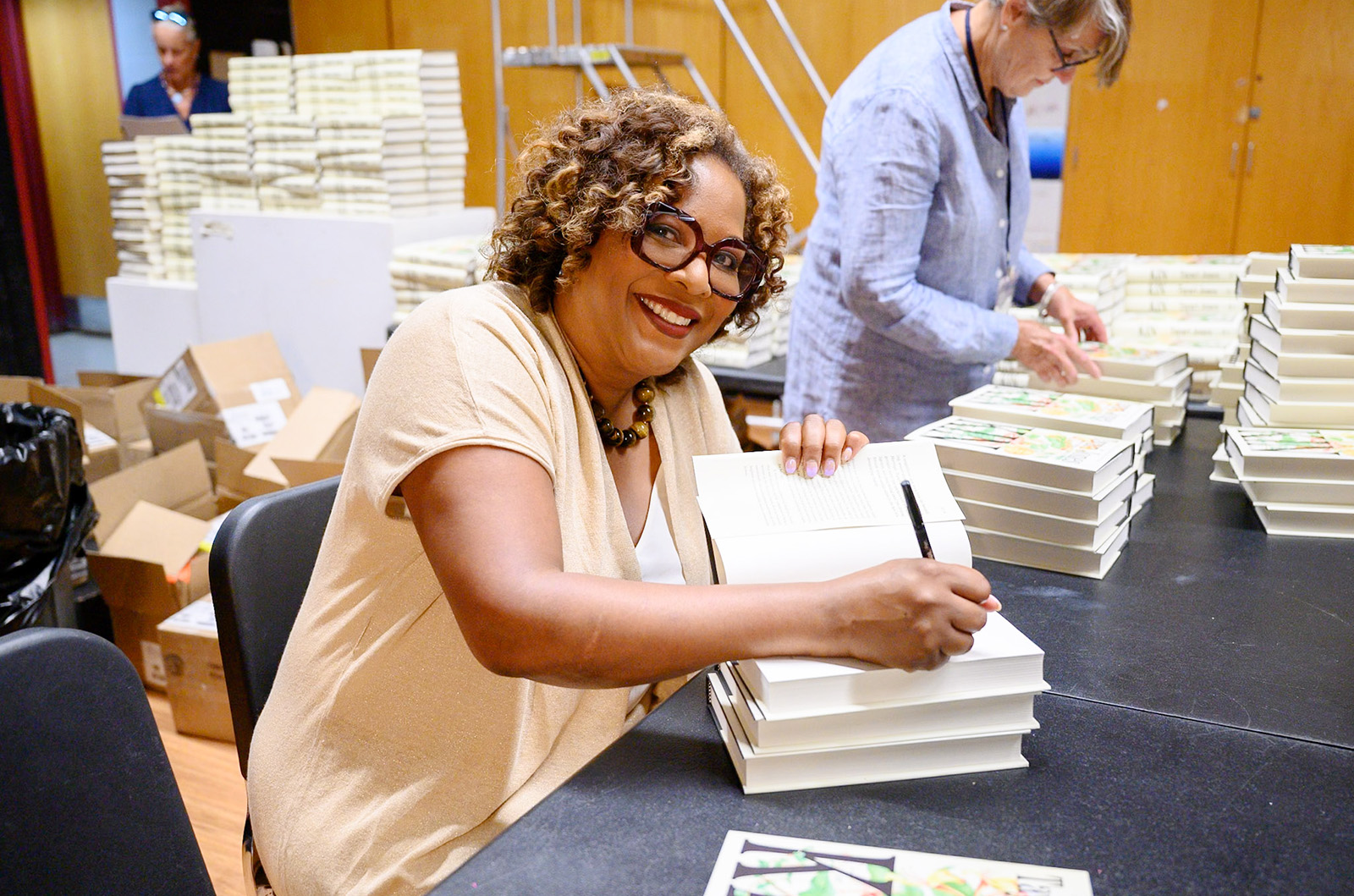 Signing books after the talk.