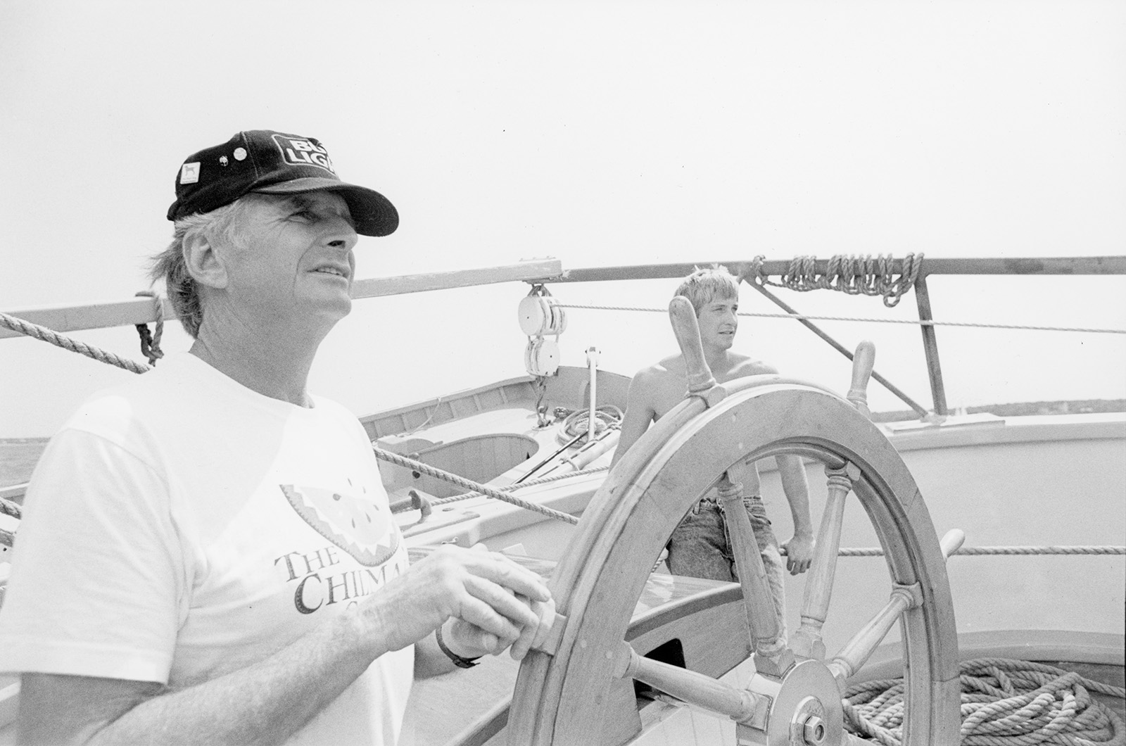 Capt. Robert Douglas at the helm.