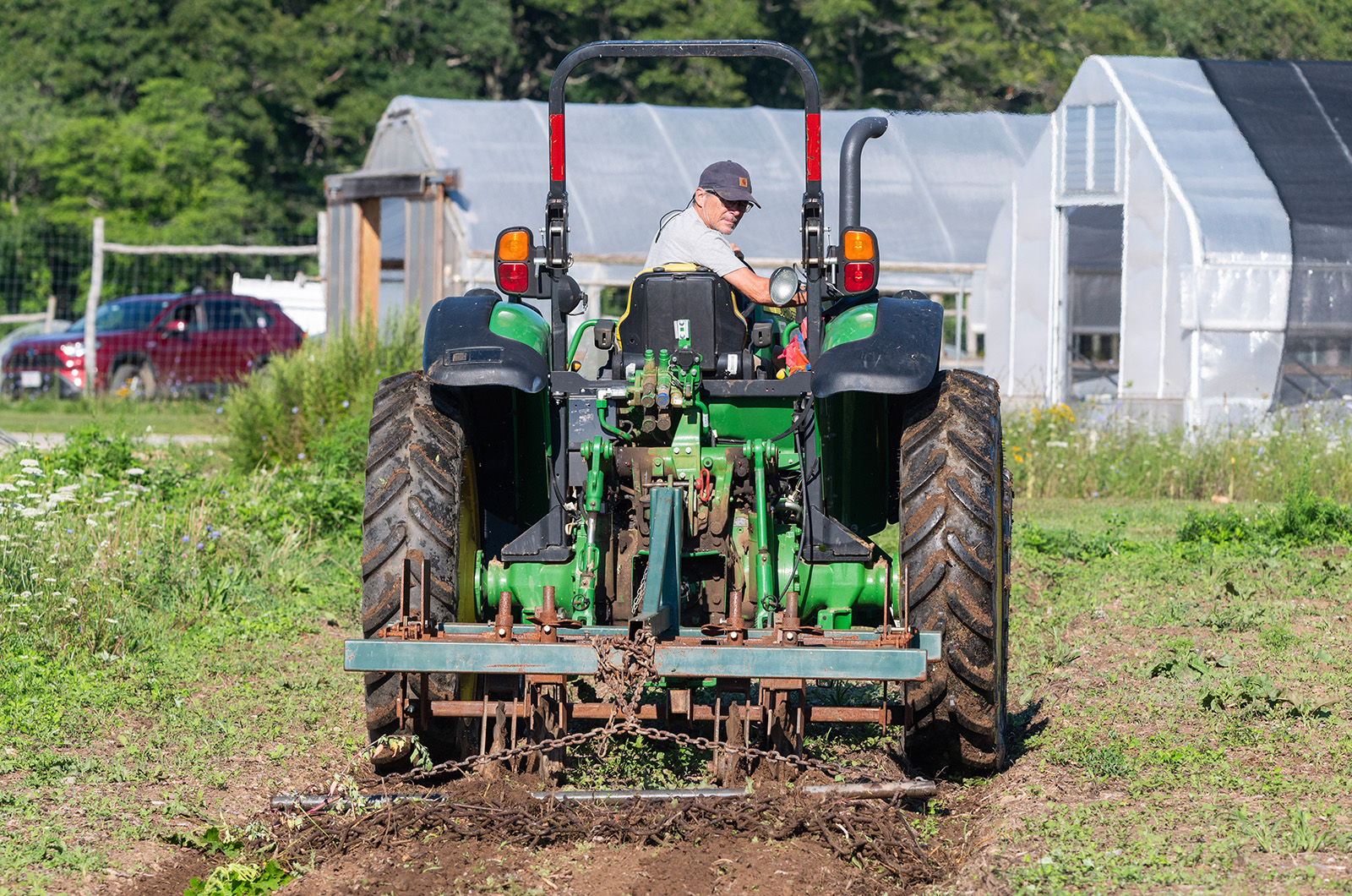 Tilling the soil at Island Grown.