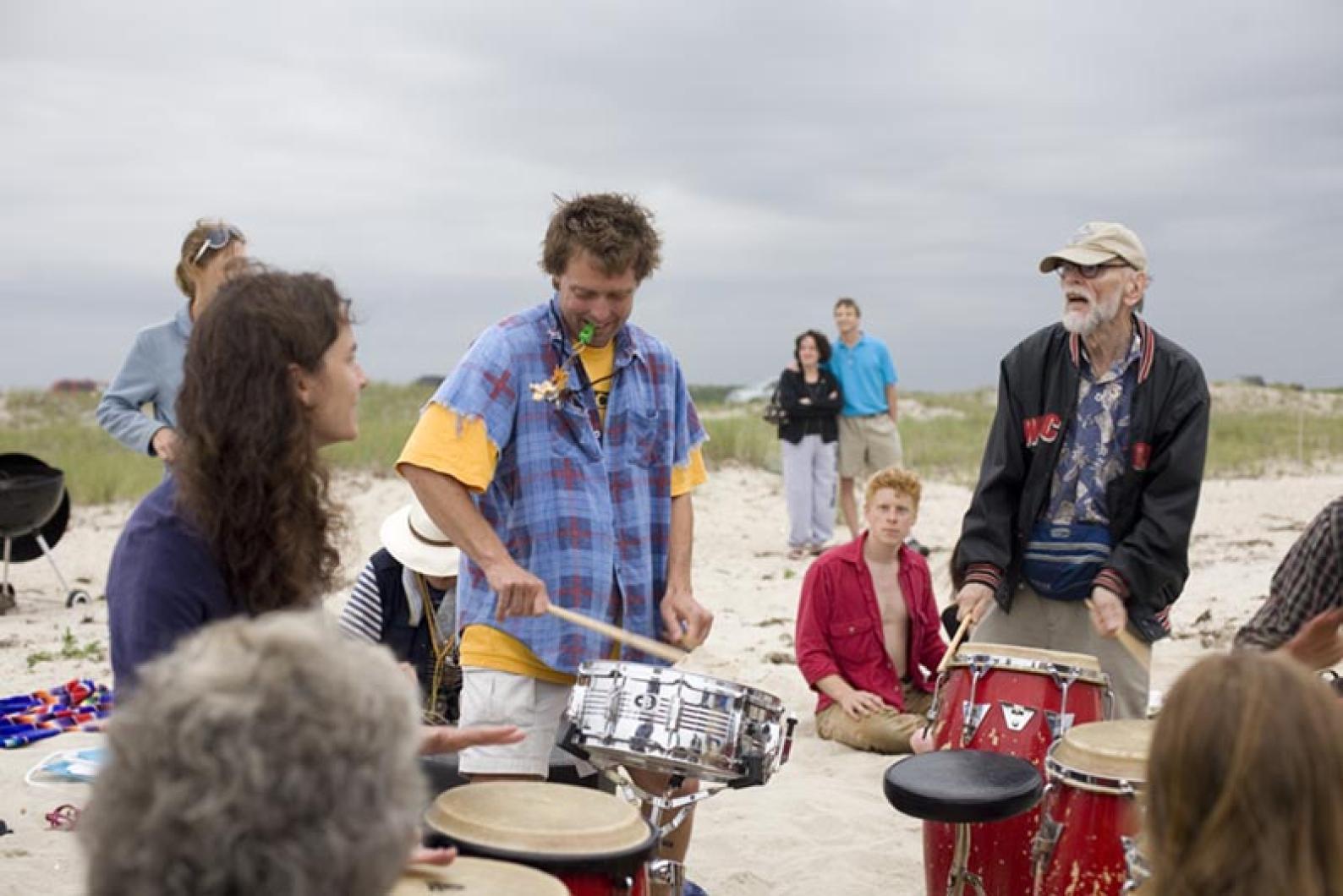 Drummers play on the beach