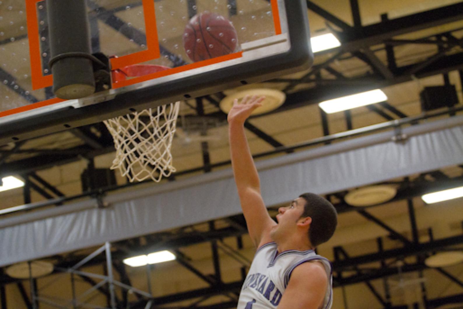 Senior Del Araujo tips it into the basket during a semifinal match Wednesday against Westwood.