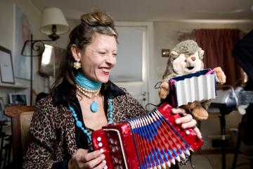 bella playing accordian