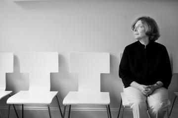 Joann Breuer in a chair