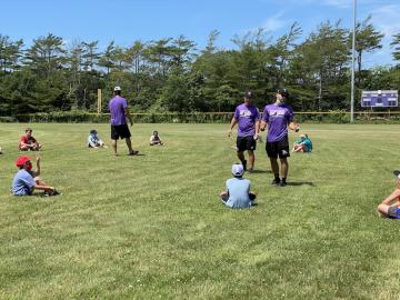 Sharks alums Nick Raposo and Collin Shapiro talk to kids about baseball fundamentals.