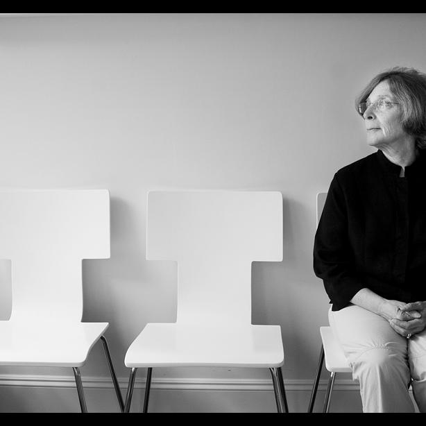 Joann Breuer in a chair