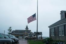 Flag at half mast, to remember Pat Costa, a former town employee.