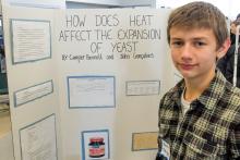 How does heat affect the expansion of yeast? A project by Cooper Bennett, shown, and John Gencalves. Cooper Bennett is shown.