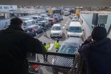 Freight boat Sankaty fills up quickly with cars.