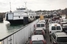 Freight boat Sankaty departs Vineyard Haven.