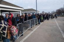 A long line of passengers await departure from Vineyard Haven.