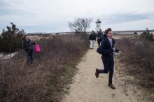 Older hunters go searching for eggs near the Edgartown Lighthouse.