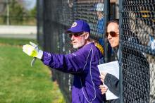 Coaches Drew Kelly and Moira Silva watch their team.