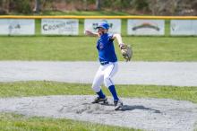 Tyler Alton winds up to throw a pitch.