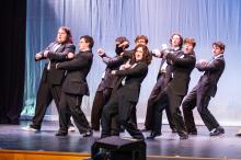 Tenors, Baritones, and Basses show off their dance moves.