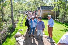 Guests make their way to tour the new buildings.