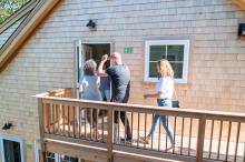 The apartments consist of two duplexes with living spaces above and below.