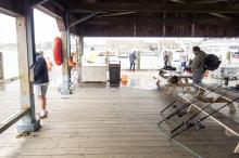 There is always a morning fishing scene at Memorial Wharf in Edgartown.