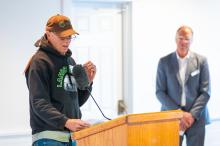David Two Arrows Vanderhoop accepts a grant on behalf of Sassafrass Earth Education.