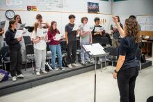Minnesingers director Abigail Chandler conducting.
