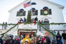 Parade viewers gather at Edgartown Town Hall.