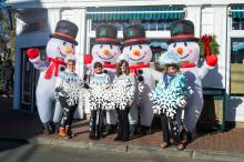 The well-known "Yeti" club always claims the same spot along the parade route.