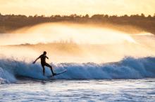 Jamie Greene surfing late in the day.