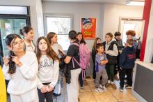 Kids from the nearby Edgartown School line up ahead of time.