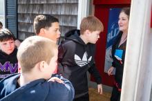 Co-owner Kirsten Anderson opens the doors.