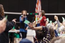 Voting with cards in West Tisbury.