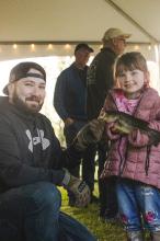 Many proud grins as young anglers haul in their catches.
