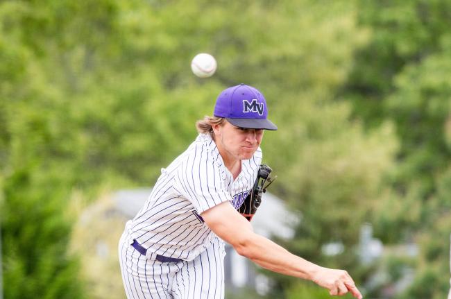 Eli Bryant spins one into the batter.