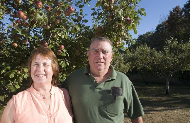 Debbie and Eric Magnuson in orchard