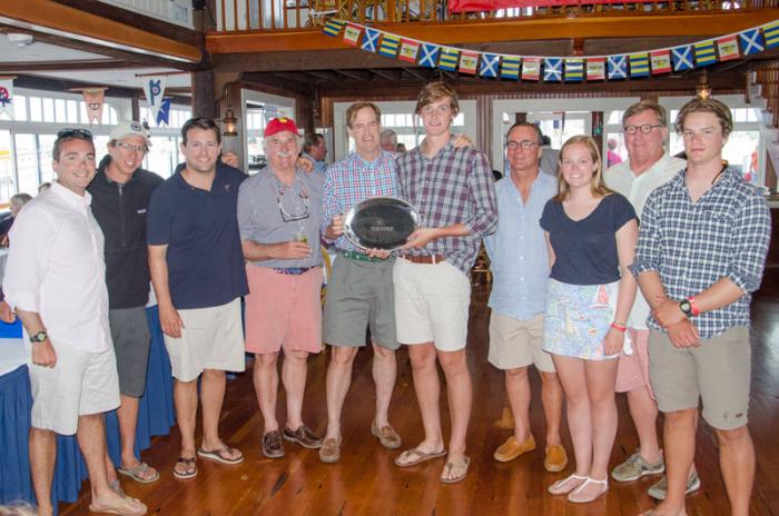 Art Santry and the crew of the Temptation celebrate two undefeated days of Round the Buoys racing.