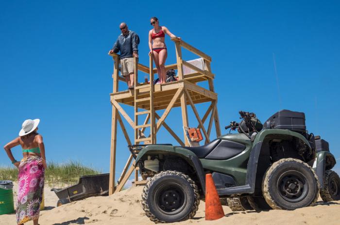 Lifeguards blew whistles and pulled swimmers out of the water twice Wednesday after hammerhead shark sightings.