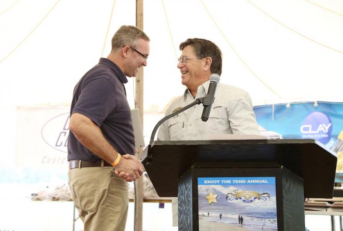 Derby president Ed Jerome (right) welcomes Derby chairman John Custer into the derby hall of fame.