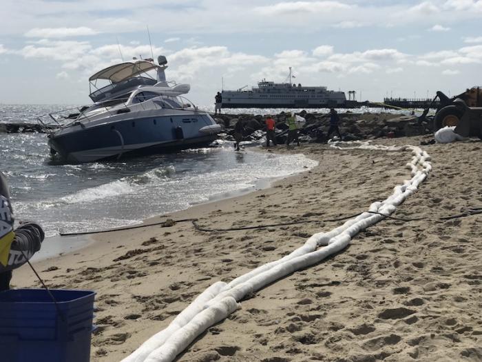 Morning after large power vessel went aground in stiff northeast breeze late Thursday.