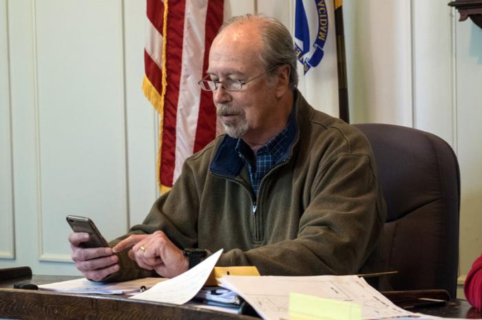 Yellow House Committee chairman Chris Scott reads email from former owner to the group.
