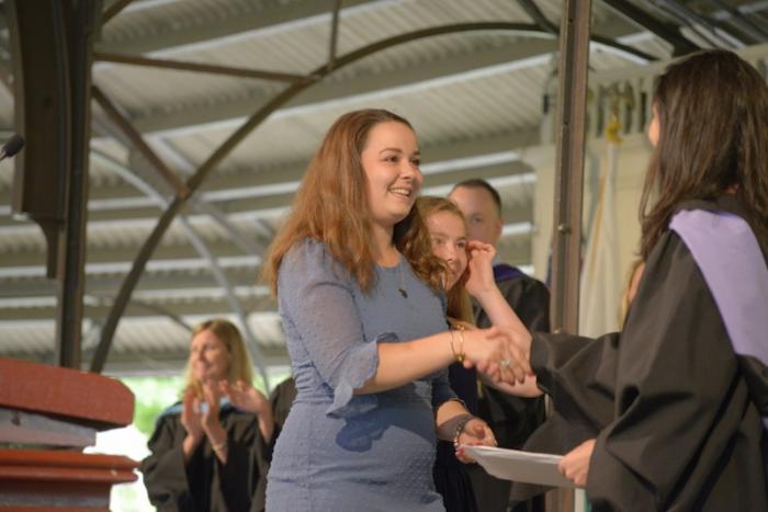 Rya and Jayden Baird accept diploma on behalf of their brother Jake, who died in January.