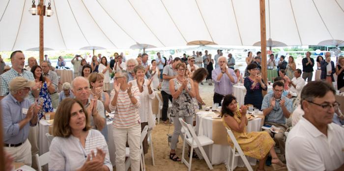 Crowd rises to its feet after announcement of $1 million gift from Martha's Vineyard Bank.