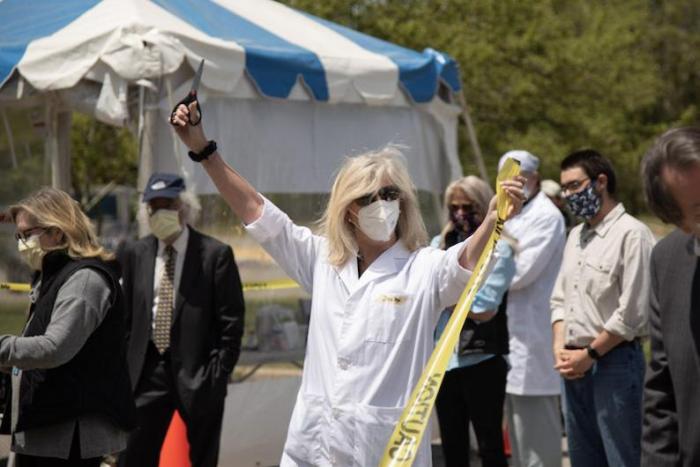 Free coronavirus testing site at the regional high school opened in early June; Deb Rusckowski cut the ribbon.
