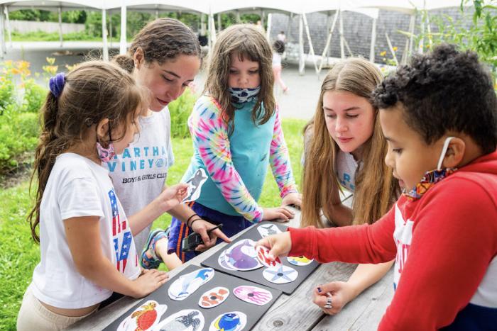 From left, camper Nicoly Matheus, counselor Rachel Greene, campers Laura Noonan and Ally Bragham.