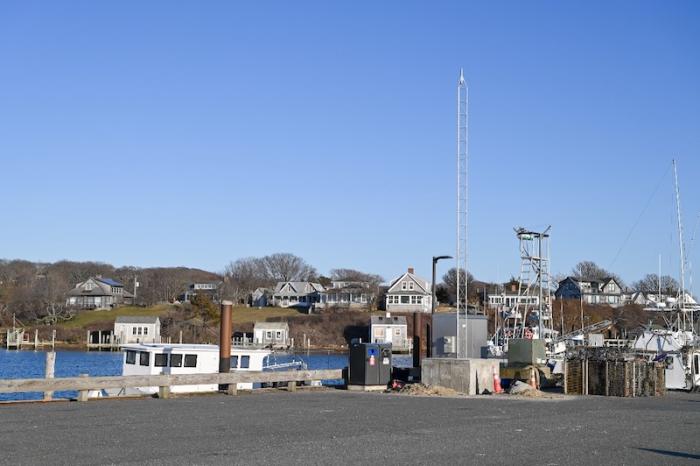 Set in concrete and rising 30 feet, the tower is meant to house security cameras within eye-shot of the harbor master shack.