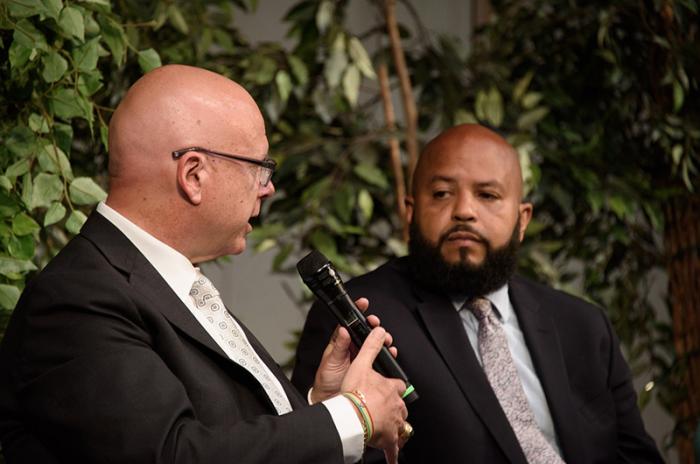 Andrew Patch, camp meeting association president, talks with Arthur Hardy-Doubleday, president of the Martha's Vineyard NAACP.