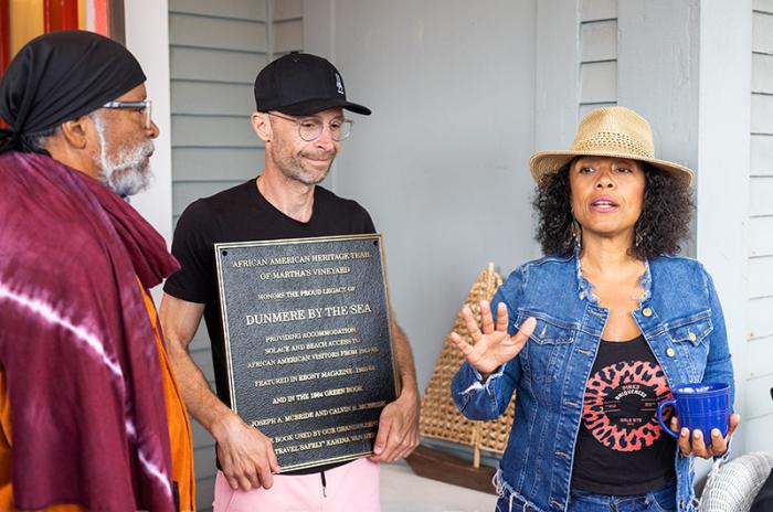 Chistopher Simms, Claudio Casarotti and Kahina Van Dyke on the porch of Dunmere by the Sea.