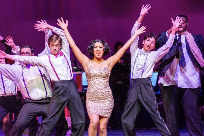 Annabelle Brothers (center) as Roxie.