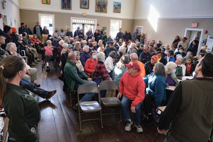 Saturday's talk on coyotes at the Martha's Vineyard Agricultural Society hall drew a crowd. Pet safety was a chief concern for attendees.