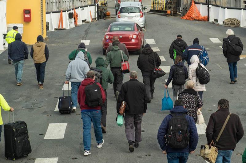 Woods Hole at last. Passengers leave freight boat Sankaty.