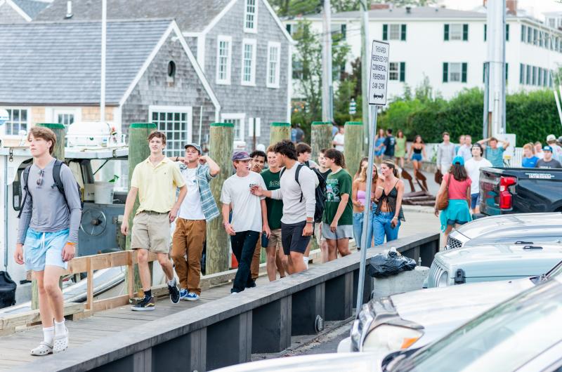 Young people make their way through Edgartown to hear "The Dock Dance Band."